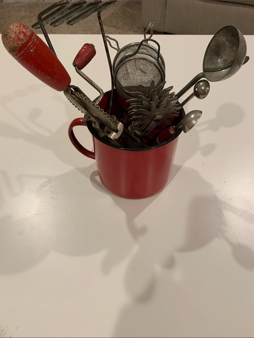 Antique Red Kitchen Utensil Holder with Assorted Tools
